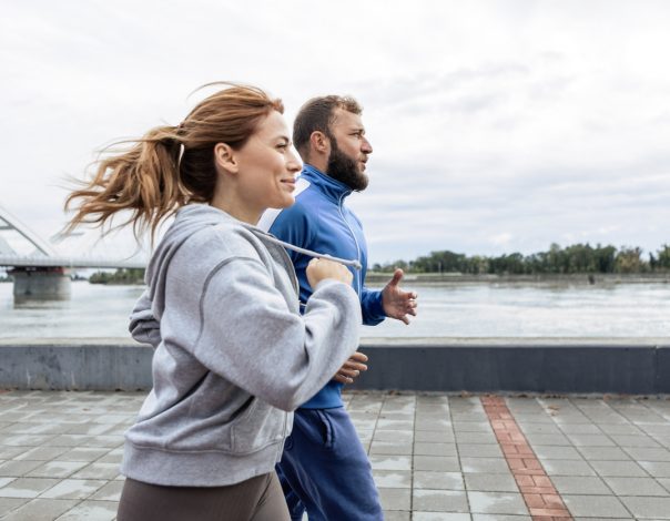 Young Couple Exercising Outdoors